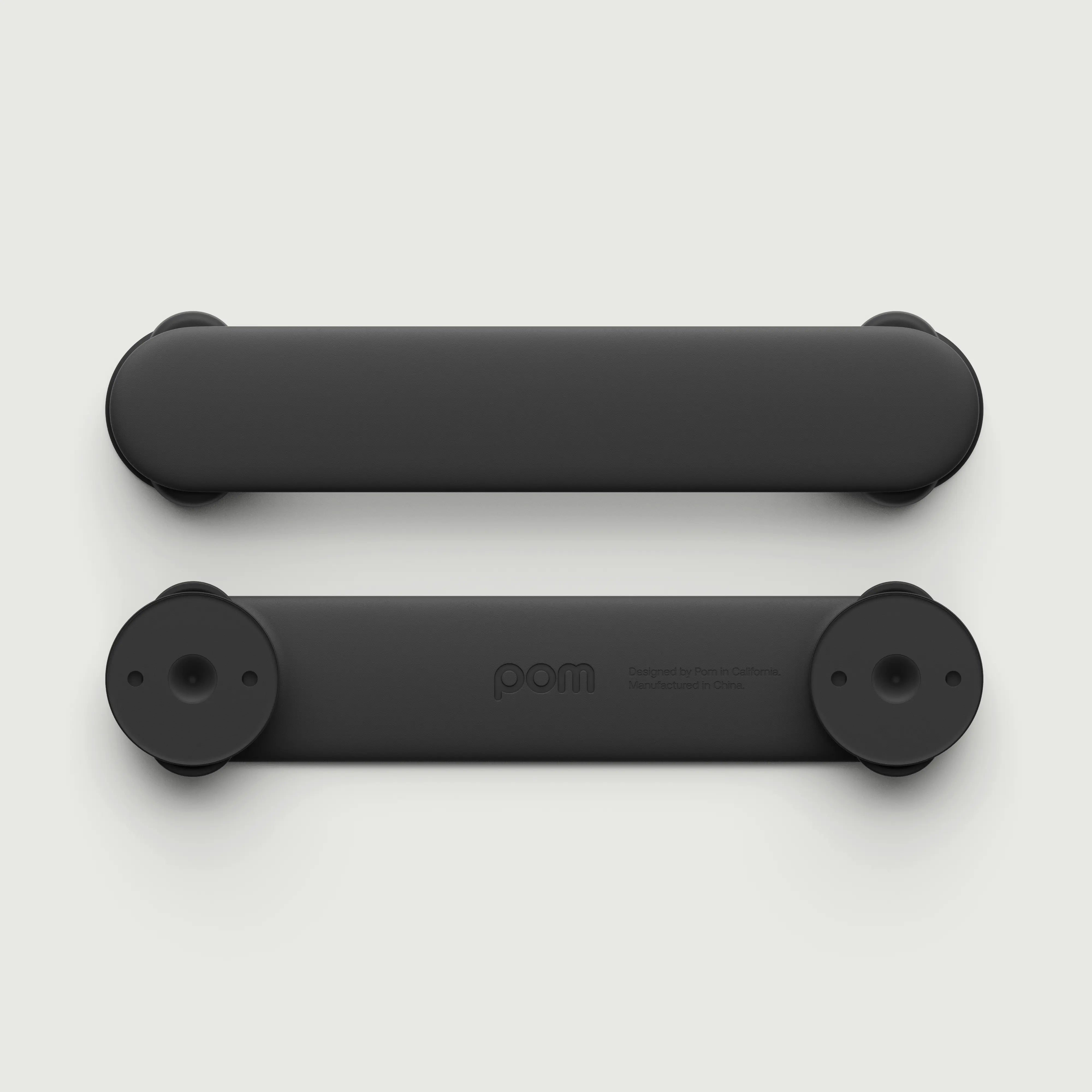 Pom Strap Lock — babyproof cabinets, drawers, and appliances with a modern, durable safety lock. Easy to install, secure, and designed for busy little ones.