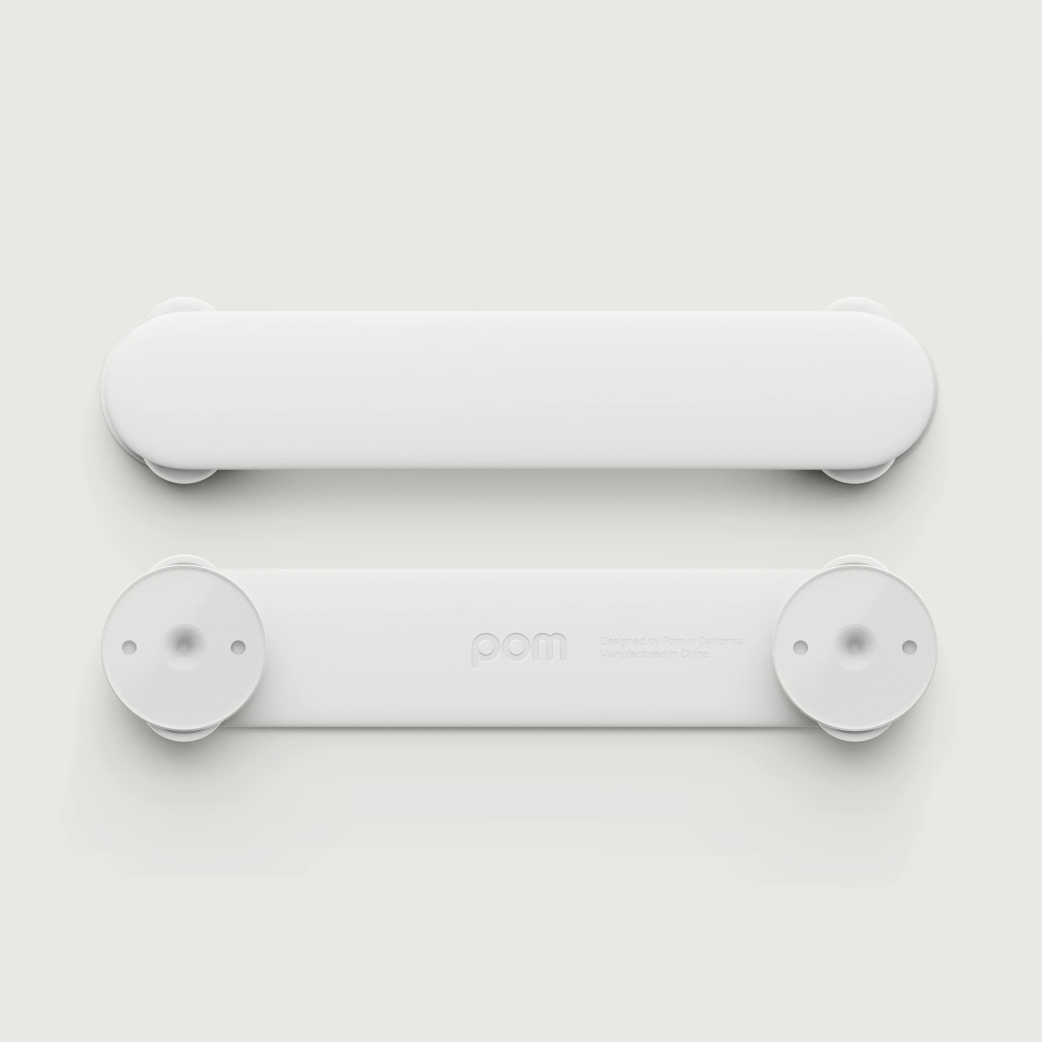 Pom Strap Lock — babyproof cabinets, drawers, and appliances with a modern, durable safety latch. Easy to install, secure, and designed for busy little ones.