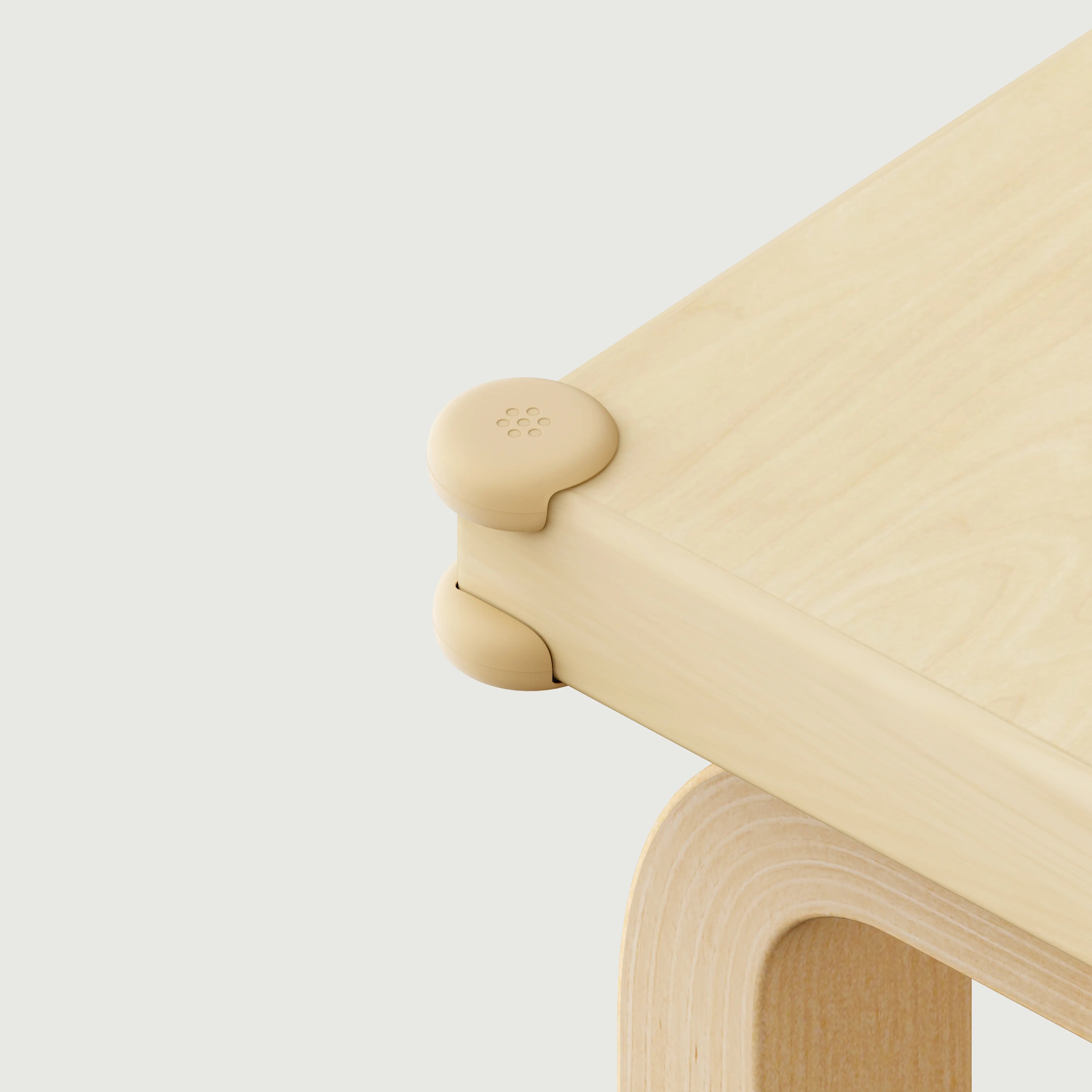 Pom Corner Protector — soft silicone babyproofing guard for sharp furniture corners