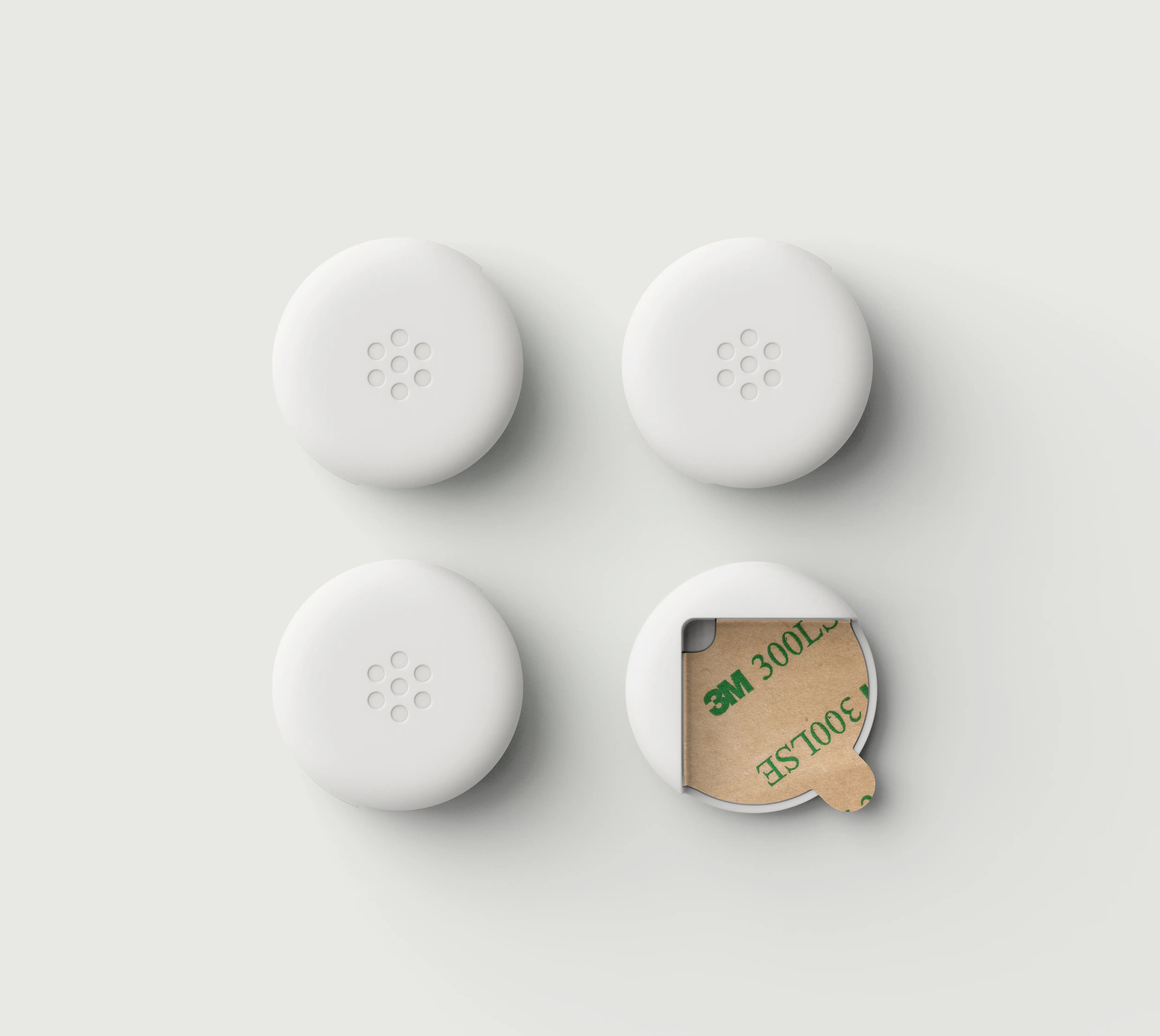 Pom Corner Protector — soft silicone babyproofing guard for sharp furniture corners in white